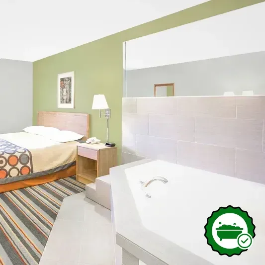 In-room jacuzzi at Super 8 by Wyndham East Moline in East Moline
