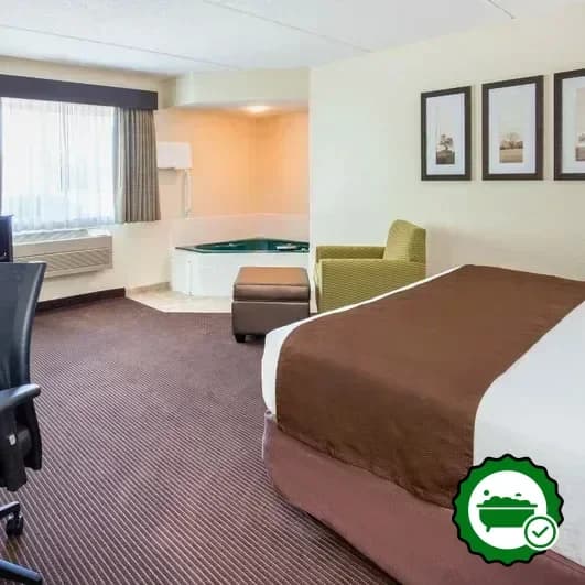 In-room jacuzzi at AmericInn by Wyndham Rhinelander in Rhinelander