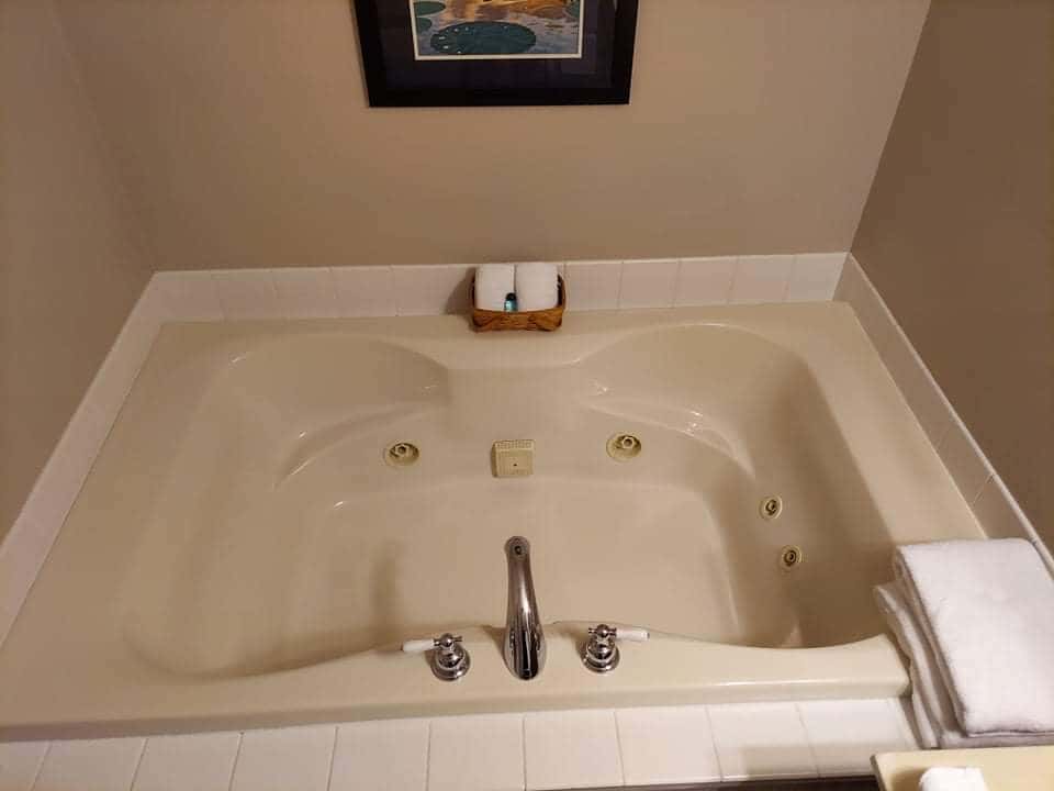 In-room jacuzzi tub at Wampler House Boutique Hotel in Bloomington, MN